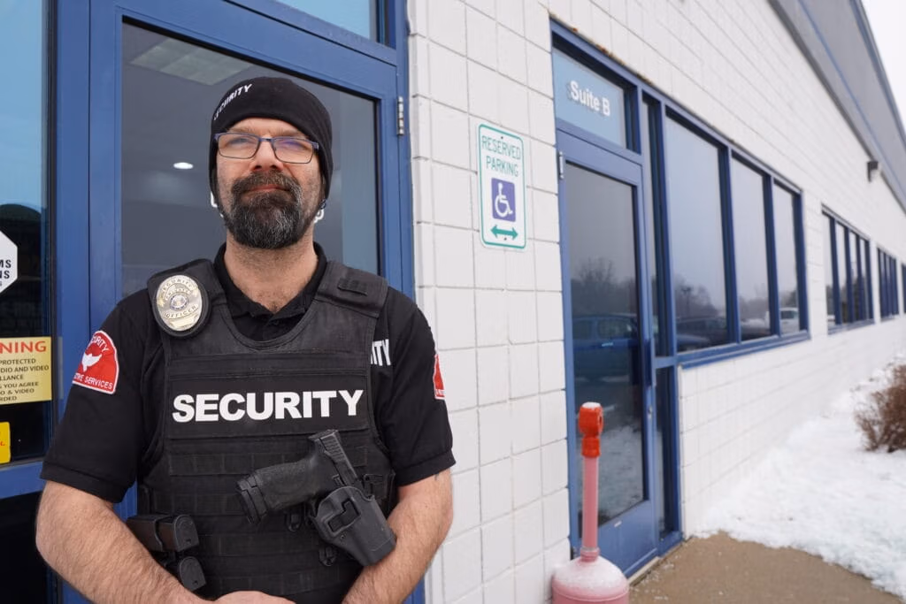 security guard guarding a door